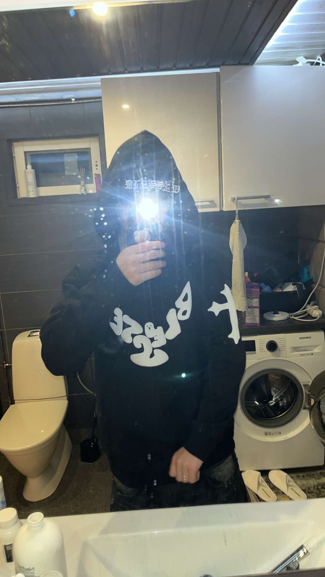 Hood up mirror selfie in the Blessed hoodie
